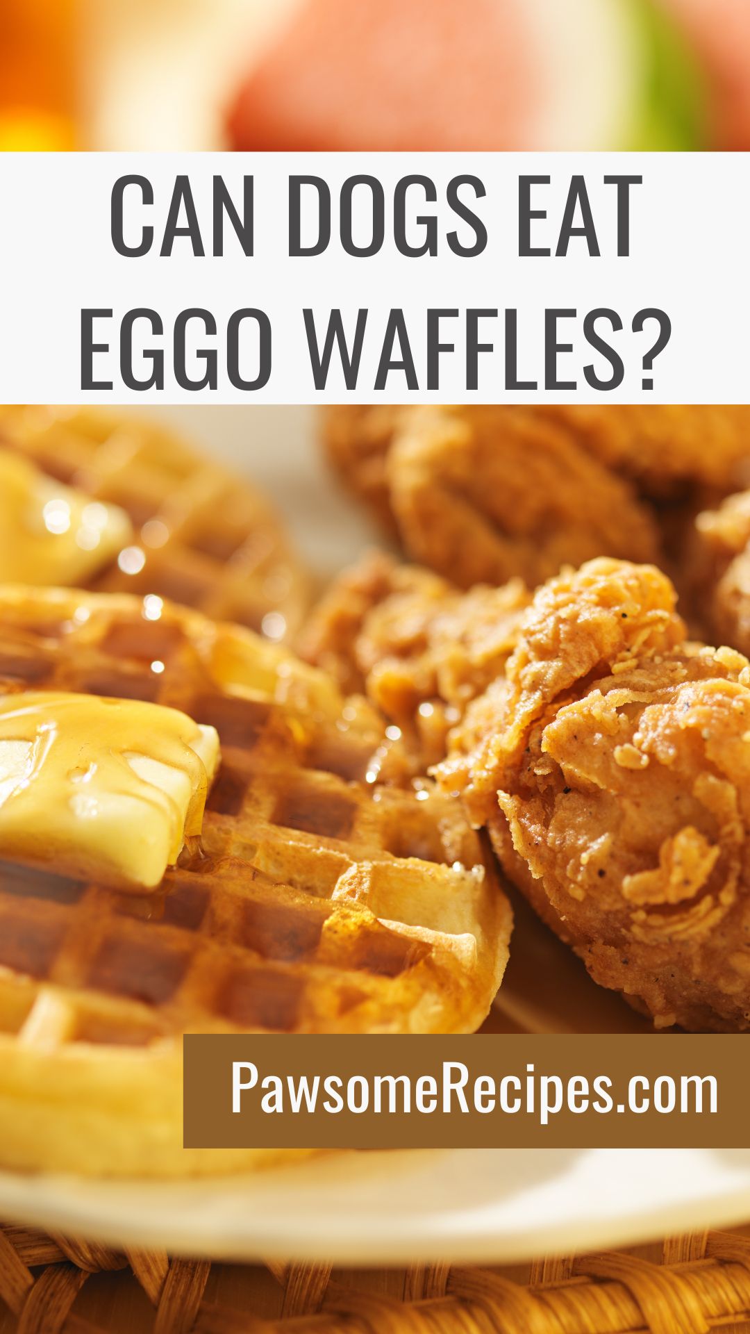 Close-up of a plate with Eggo waffles topped with butter and pieces of fried chicken; overlaid text reads, "Can dogs eat Eggo waffles? PawsomeRecipes.com.